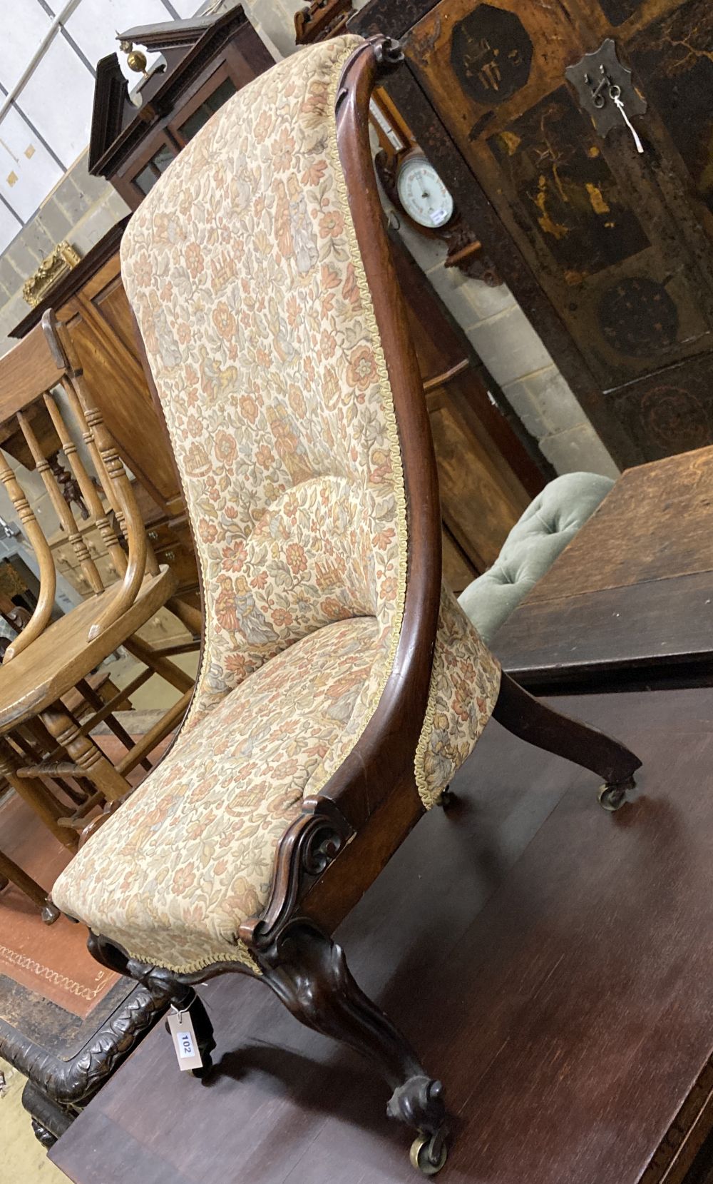 A Victorian rosewood nursing chair